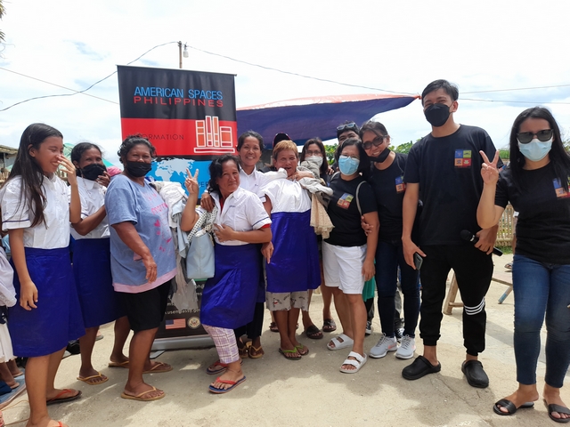 CPU Librarians and Staff distribute donations for Typhoon Agaton victims in Batad, Iloilo